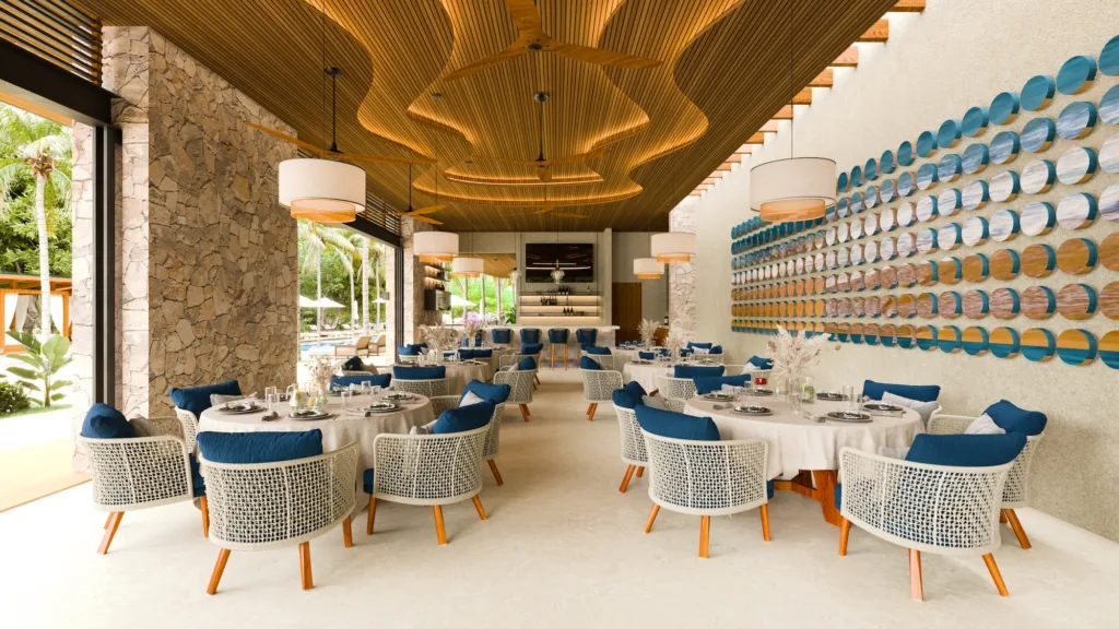 El restaurante del Ocean Club, abierto a los jardines y a la terraza de la piscina